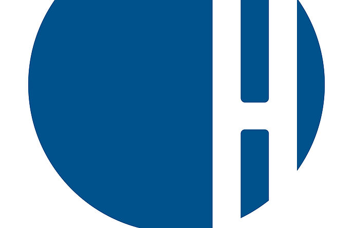 Hohenstein in all capital letters with blue dot